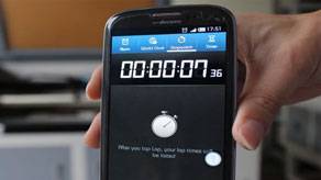 hand holding a mobile phone with the timer app running